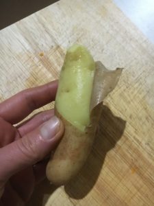 Peeling Kipfler Potato